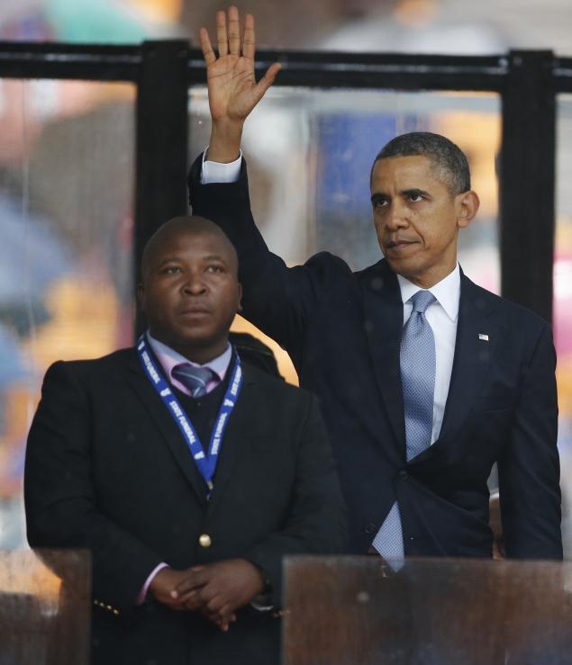 Obama with interpreter who can't interpret